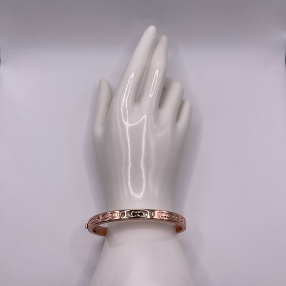COACH Women's Rose Gold Kissing C Logo Signature Hinged Crystal Bangle Bracelet - Picture 3 of 12
